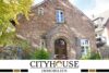 CITYHOUSE: Freistehendes, charmantes Einfamilienhaus, denkmalgeschützt mit kleinem Garten, Terrasse - Vorderaufnahme Haus